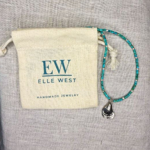 Age Turquoise and Sterling + Charm Necklace