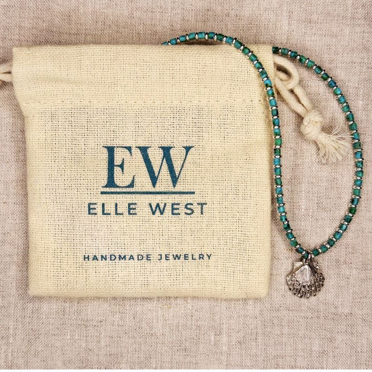 Age Turquoise and Sterling + Charm Necklace